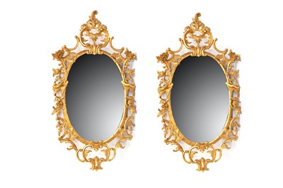 Lot 781 - A pair of 19th Century giltwood oval mirrors
