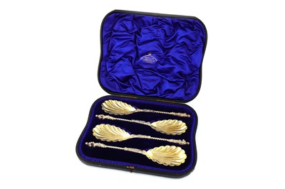 Lot 40 - A set of four Victorian parcel-gilt sterling silver apostle spoons