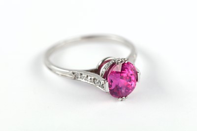 Lot 11 - A ruby and diamond ring