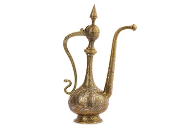 Lot 320 - A QAJAR SILVER-INLAID BRASS EWER