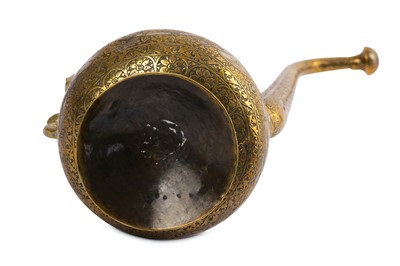 Lot 320 - A QAJAR SILVER-INLAID BRASS EWER