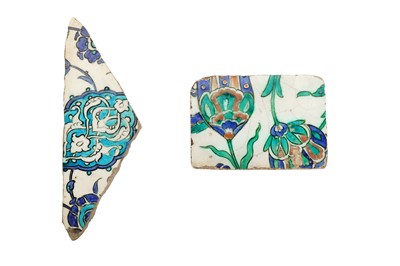 Lot 289 - FOUR DAMASCUS AND IZNIK POTTERY TILE FRAGMENTS