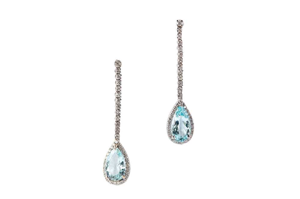 Lot 22 - A pair of aquamarine and diamond pendent earrings