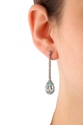Lot 22 - A pair of aquamarine and diamond pendent earrings