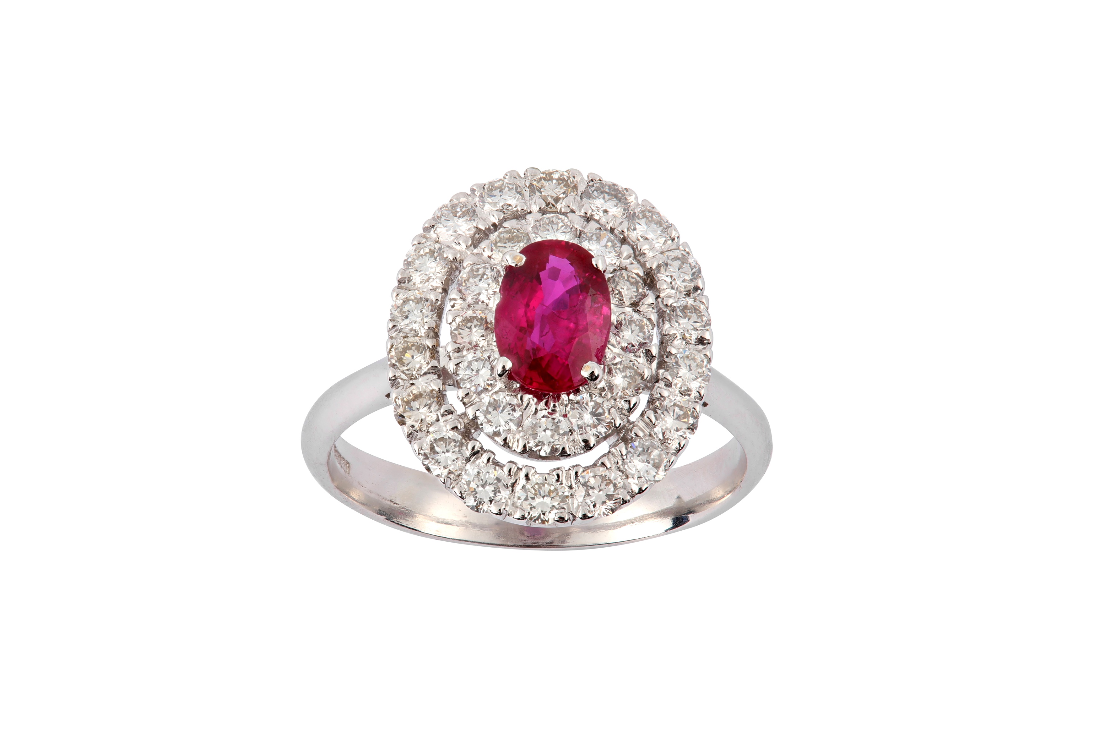 Lot 64 - A ruby and diamond target ring