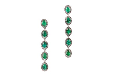 Lot 4 - A pair of emerald and diamond pendent earrings