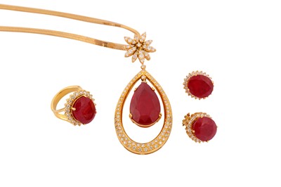 Lot 56 - A treated ruby and diamond necklace, earclips and ring suite