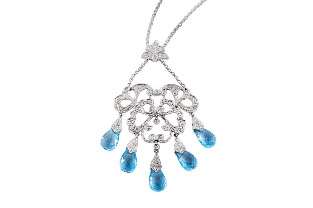 Lot 13 - A blue topaz and diamond pendant necklace