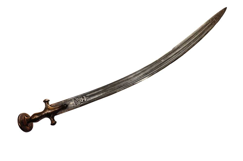 Lot 336 - A SILVER AND GOLD-INLAID INDIAN TULWAR