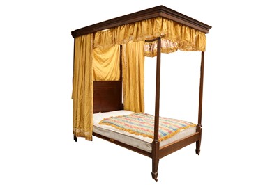 Lot 829 - An early 20th Century Heal & Son walnut four poster bed