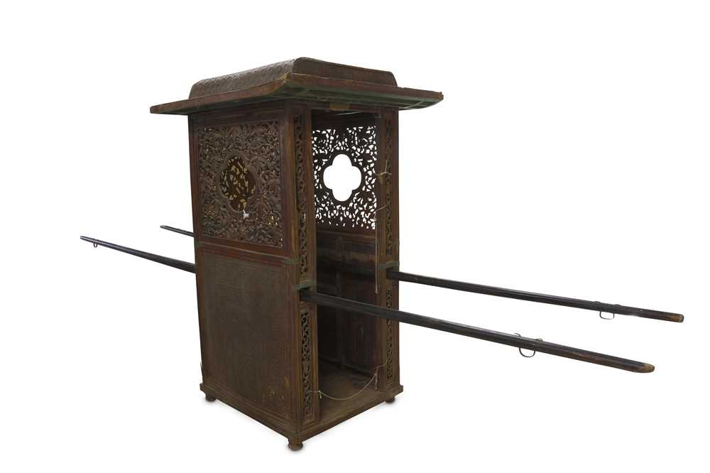 Lot 297 - A Chinese hardwood sedan chair.