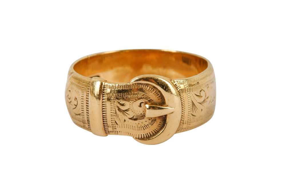 Lot 125 - A 9 carat gold engraved buckle ring