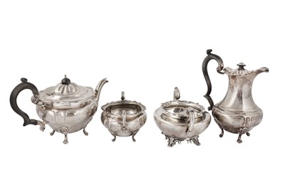Lot 15 - A George V sterling silver three piece tea set