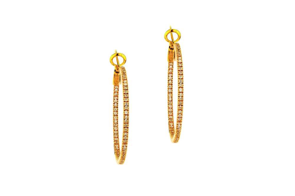 Lot 83 - A pair of diamond hoop earrings