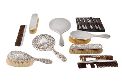 Lot 24 - A collection of sterling silver mounted dressing table items