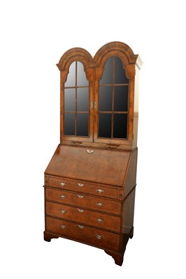 Lot 823 - An Edwardian Queen Anne style walnut bureau bookcase
