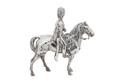 Lot 429 - A George V Scottish sterling silver figure of a Royal Scots Grey soldier on horse, Edinburgh 1919 by Hamilton and Inches