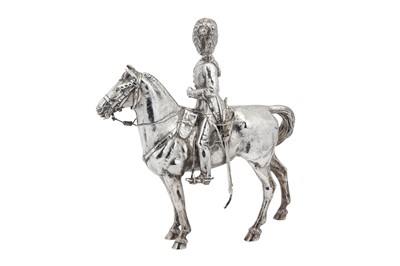 Lot 429 - A George V Scottish sterling silver figure of a Royal Scots Grey soldier on horse, Edinburgh 1919 by Hamilton and Inches