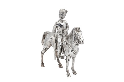 Lot 429 - A George V Scottish sterling silver figure of a Royal Scots Grey soldier on horse, Edinburgh 1919 by Hamilton and Inches