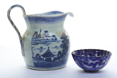 Lot 142 - A 18th century Chinese willow pattern jug