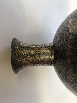 Lot 416 - A SILVER AND GOLD-INLAID IRON 'LOTUS' STEM CUP.