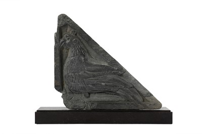 Lot 165 - A TRIANGULAR RELIEF CARVING WITH A ROOSTER