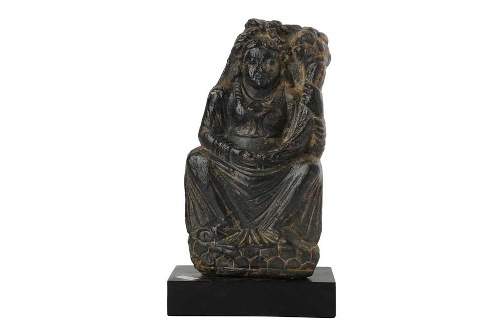 Lot 102 - A FRAGMENTARY RELIEF WITH THE GODDESS OF FERTILITY, HARITI