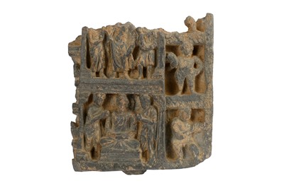 Lot 153 - A GREY SCHIST CARVED ARCHITECTURAL FRAGMENT WITH A BUDDHA IN MEDITATION