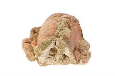 Lot 108 - A SMALL RED-PAINTED STUCCO BODHISATTVA HEAD