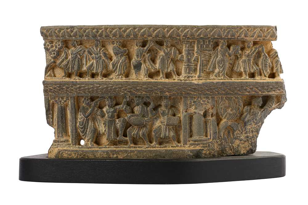 Lot 152 - A GREY SCHIST CARVED FRIEZE WITH MUSIC AND DANCE SCENES FROM THE LIFE OF SIDDHARTHA
