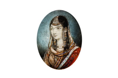 Lot 225 - λ AN INDIAN IVORY MINIATURE PORTRAIT OF A COURTLY LADY