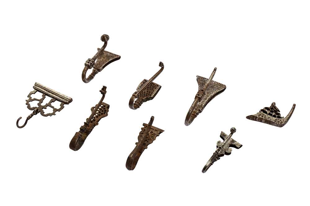 Lot 331 - A GROUP OF SIX PERSIAN STEEL BELT HOOKS AND TWO ACCESSORIES