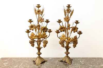 Lot 148 - A pair of 19th Century French gilt metal candelabra the five sconces