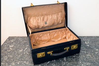 Lot 157 - A Victorian black leather suitcase