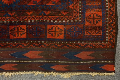 Lot 36 - AN ANTIQUE BALOUCH RUG, NORTH-EAST PERSIA