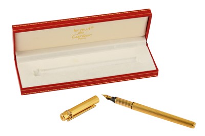 Lot 313 - A Must de Cartier gold plated fountain pen in box with papers