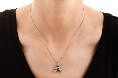 Lot 224 - A diamond-set 'Fly by Night' pendant necklace, by Stephen Webster