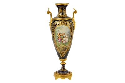 Lot 296 - A 19th Century French Sevres style ormolu mounted twin handled vase