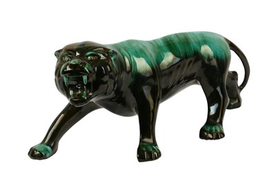 Lot 243 - A large contemporary ceramic green glaze lion figure