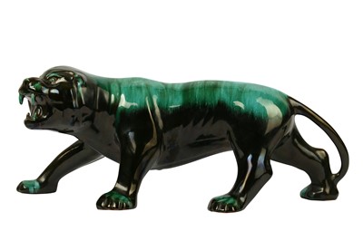 Lot 385 - A large contemporary ceramic green glaze lion figure