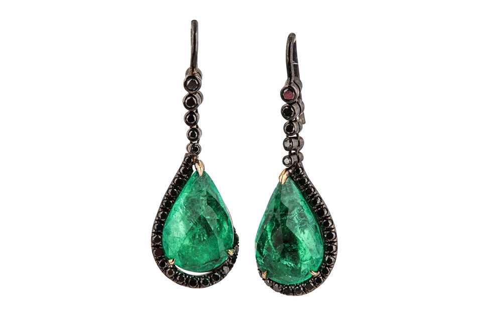 Lot 1228 - A pair of emerald earrings