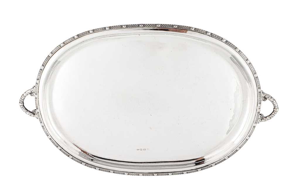 Lot 340 - A George V sterling silver ‘arts and crafts’ twin handled tray, Birmingham 1923 by A. E. Jones
