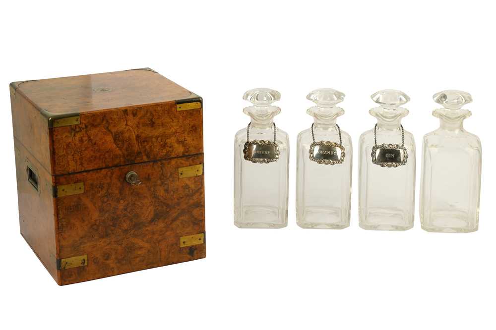 Lot 340 - A Sampson Mordan & Co Victorian burr walnut table top four bottle campaign tantalus