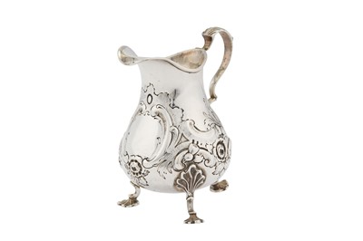 Lot 301 - A George II sterling silver cream jug, London 1749 by Dorothy Mills & Thomas Sarbitt