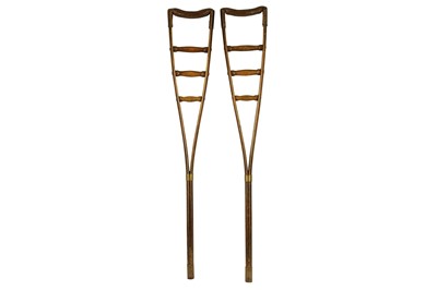Lot 338 - A pair of Victorian era oak bent wood crutches