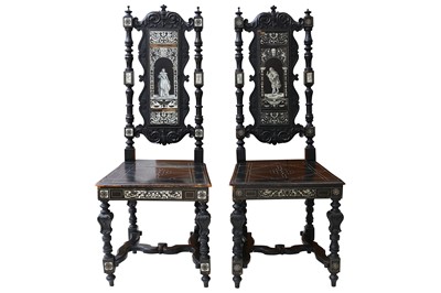 Lot 490 - A pair of Italian ivory inlaid ebony veneered and ebonised hall chairs