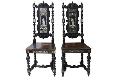 Lot 490 - A pair of Italian ivory inlaid ebony veneered and ebonised hall chairs