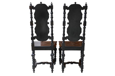 Lot 490 - A pair of Italian ivory inlaid ebony veneered and ebonised hall chairs