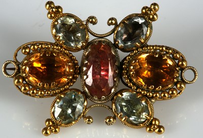 Lot 320 - A Georgian gold and gem set filigree brooch.