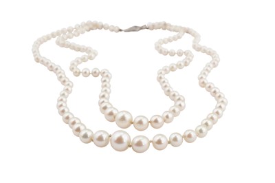Lot 171 - A double-strand cultured pearl with a sapphire and diamond clasp
